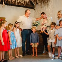Family gathered together at a christening celebration